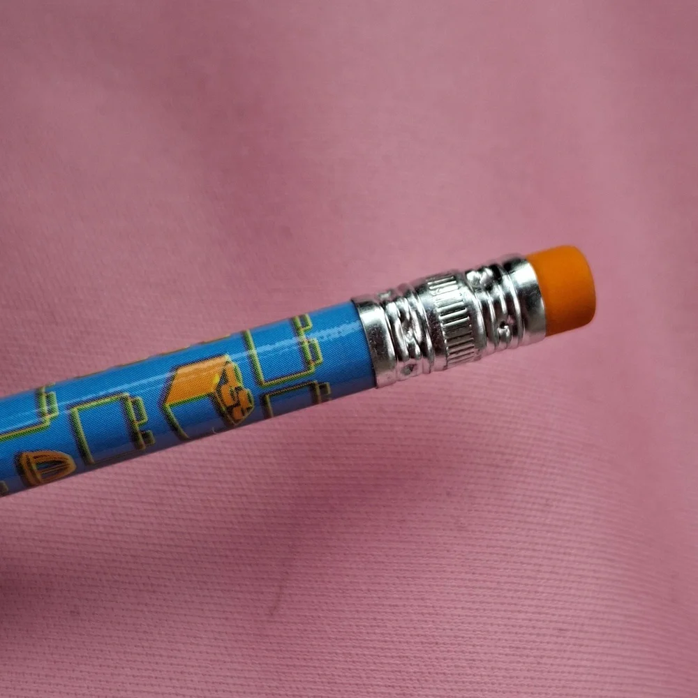 Lego Yellow & Blue Minifigure Pencil with Pink Background